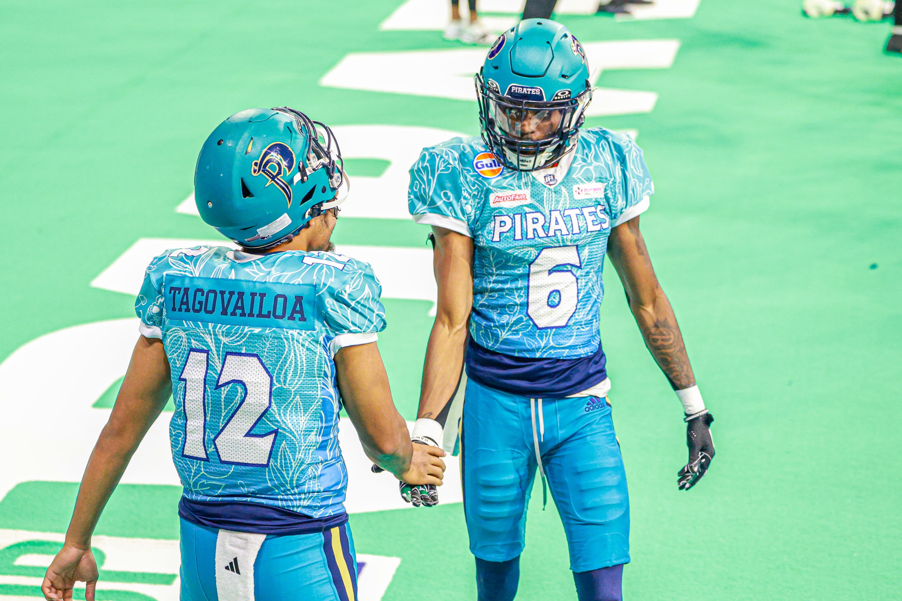Pirates mascot in arena lighting — the kind of sideline energy you will photograph during the game.