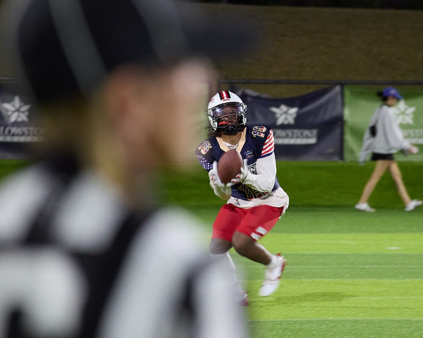 National Scouting Combine — outdoor football under the lights.
